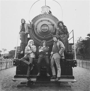 Grateful Dead at the San Francisco Zoo in 1966 by Herb Greene.