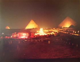 The stage for the Grateful Dead and the pyramids lit up at night